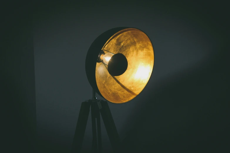 an empty antique horn on top of a tripod