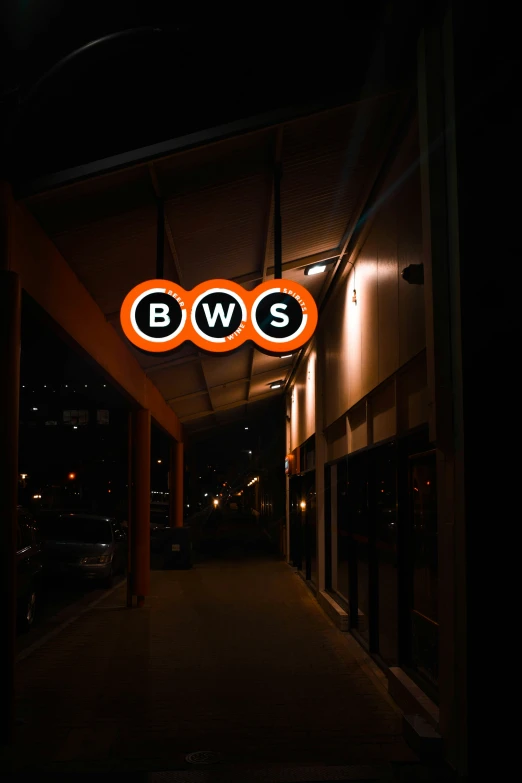 the building has two lighted orange and black logos