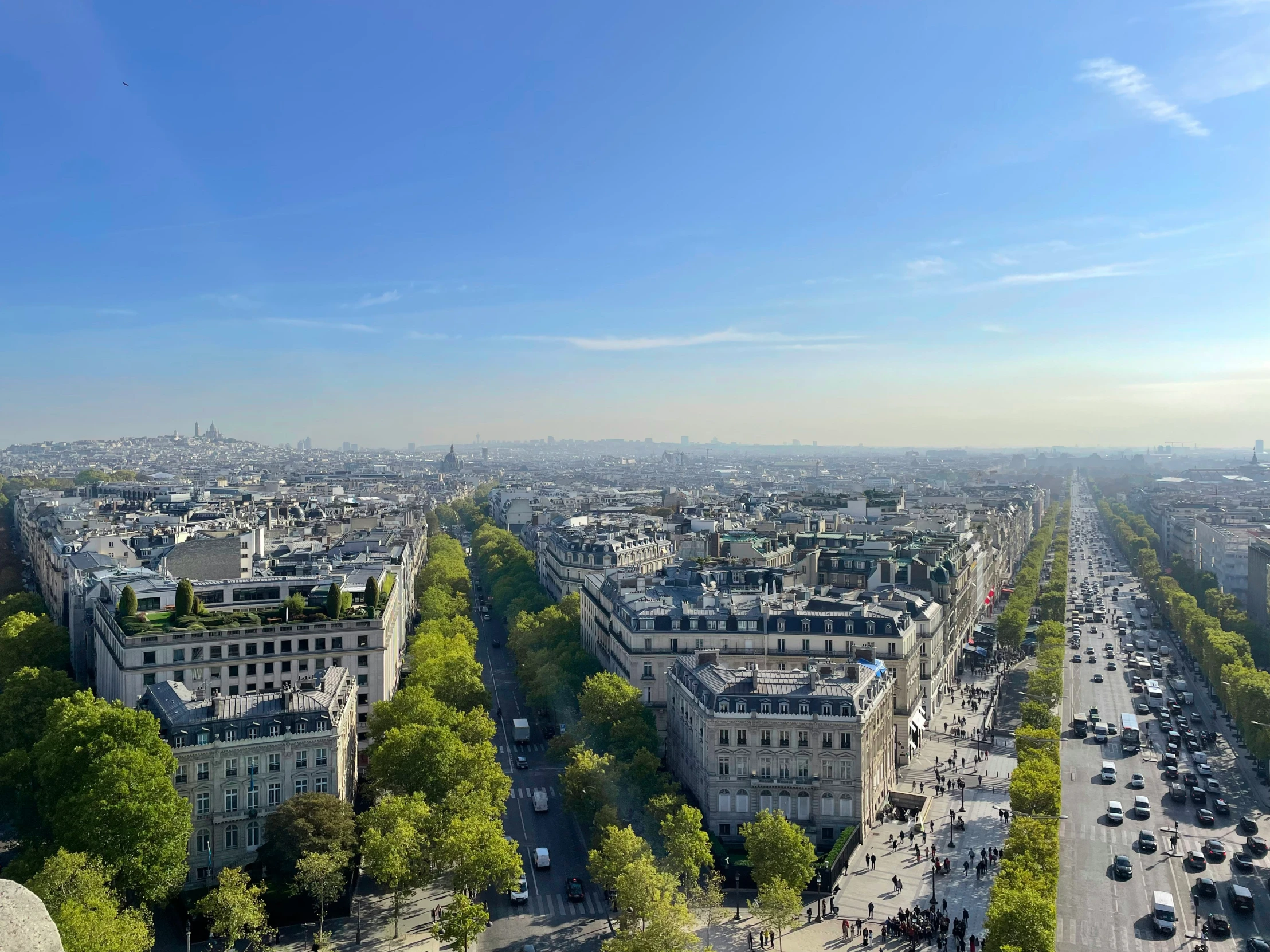 a city view with lots of traffic driving on it