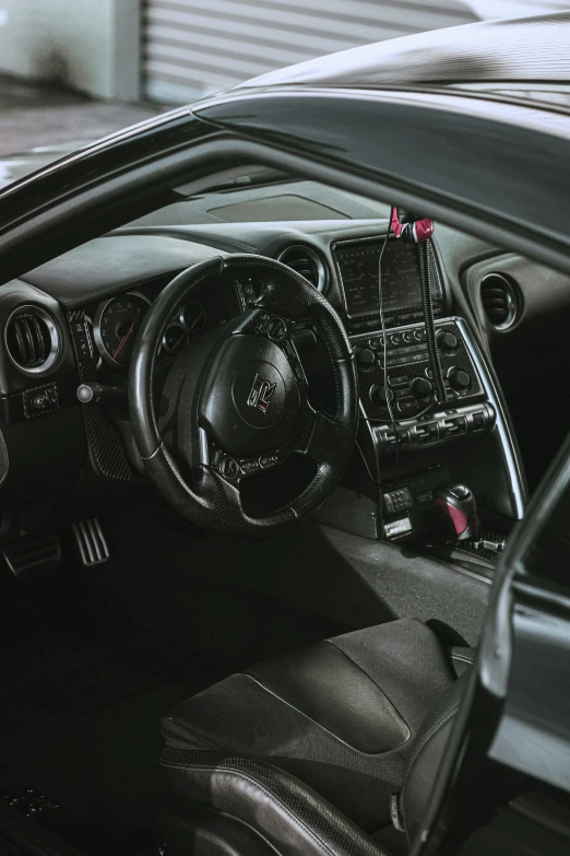 the dashboard of an automobile that has been parked in the garage