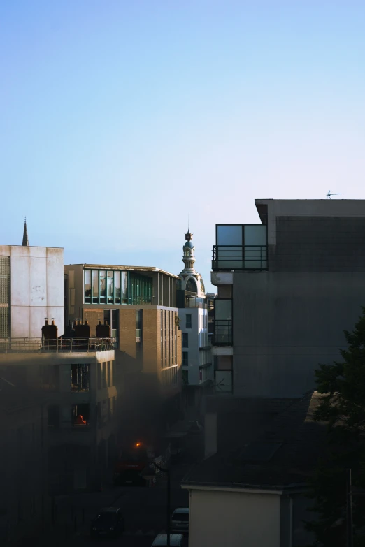 the top of buildings with a blue sky in the background