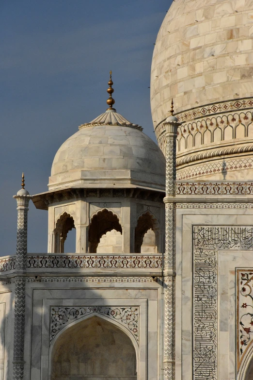 an ornate building with carvings on the outside of it