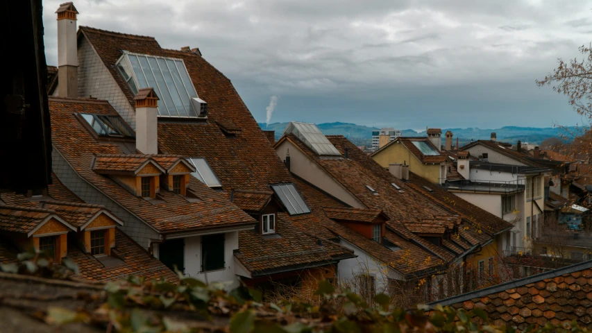 many old roof tops and windows on this city