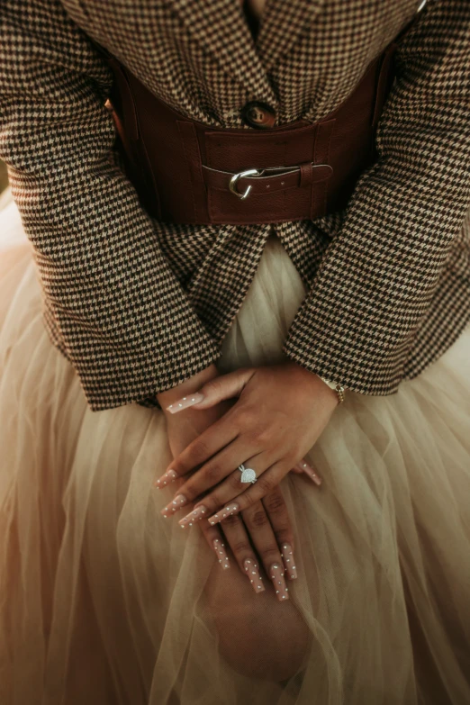 a couple who are dressed in wedding attire