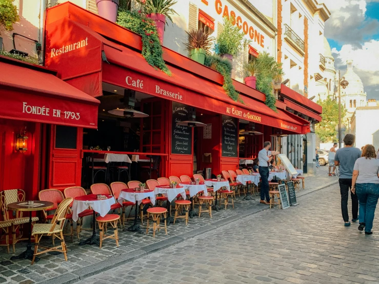 a red restaurant in the streets of france