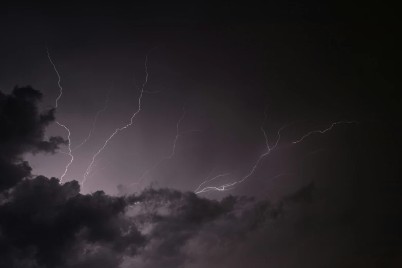 a picture of a lightning storm with multiple lights