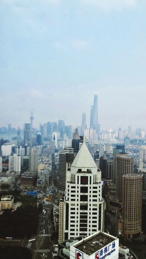 a city skyline shows the modern skyscrs in the distance