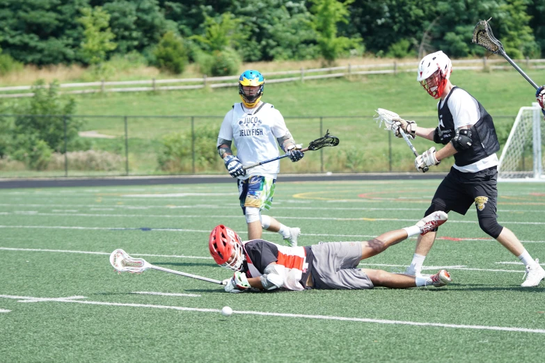 an athlete tries to save the ball from going out of bounds