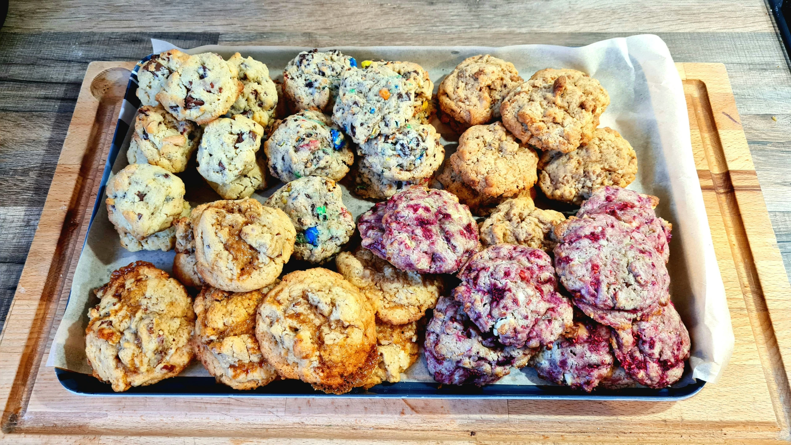 several different desserts are laying out on a tray