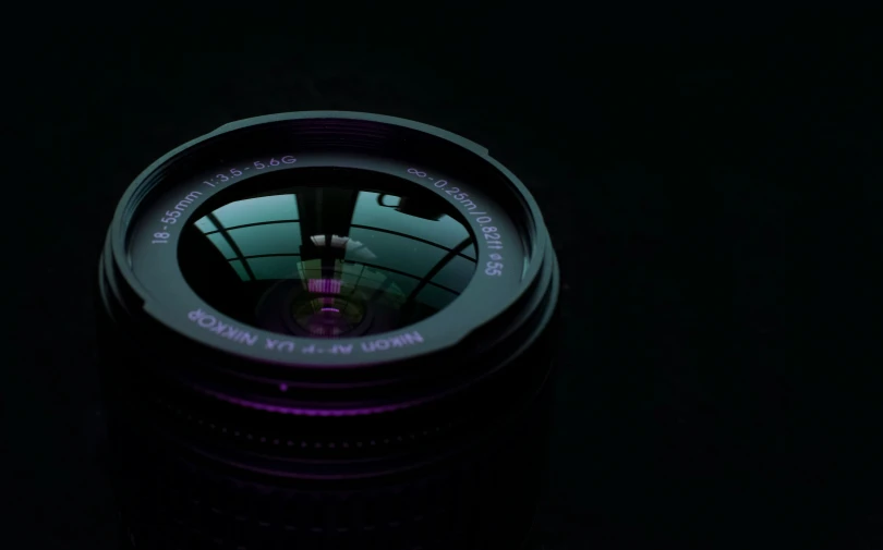 a lens s from above in the dark