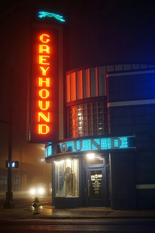 the neon sign for a casino at night