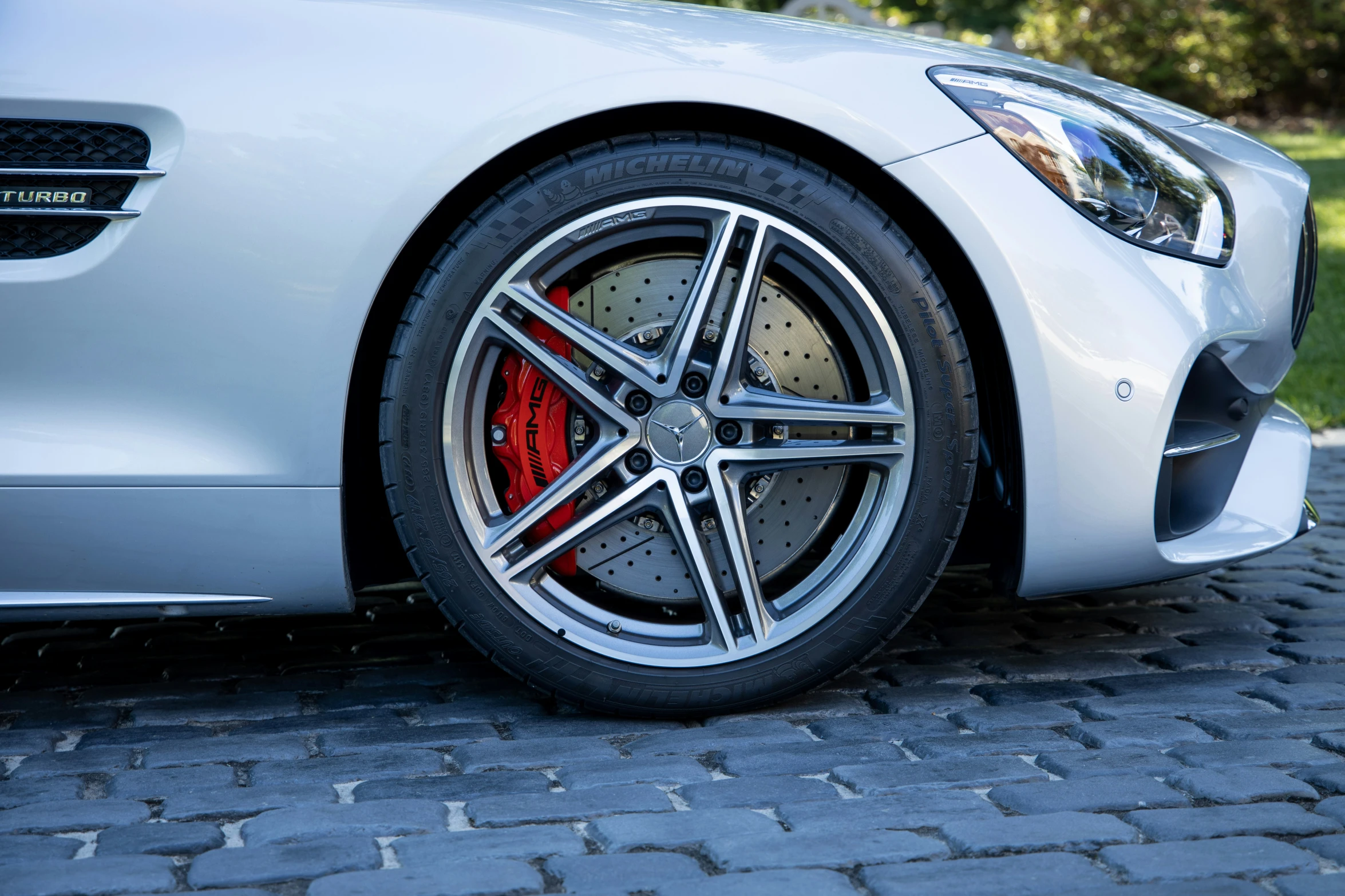 close up of rims on a car outside