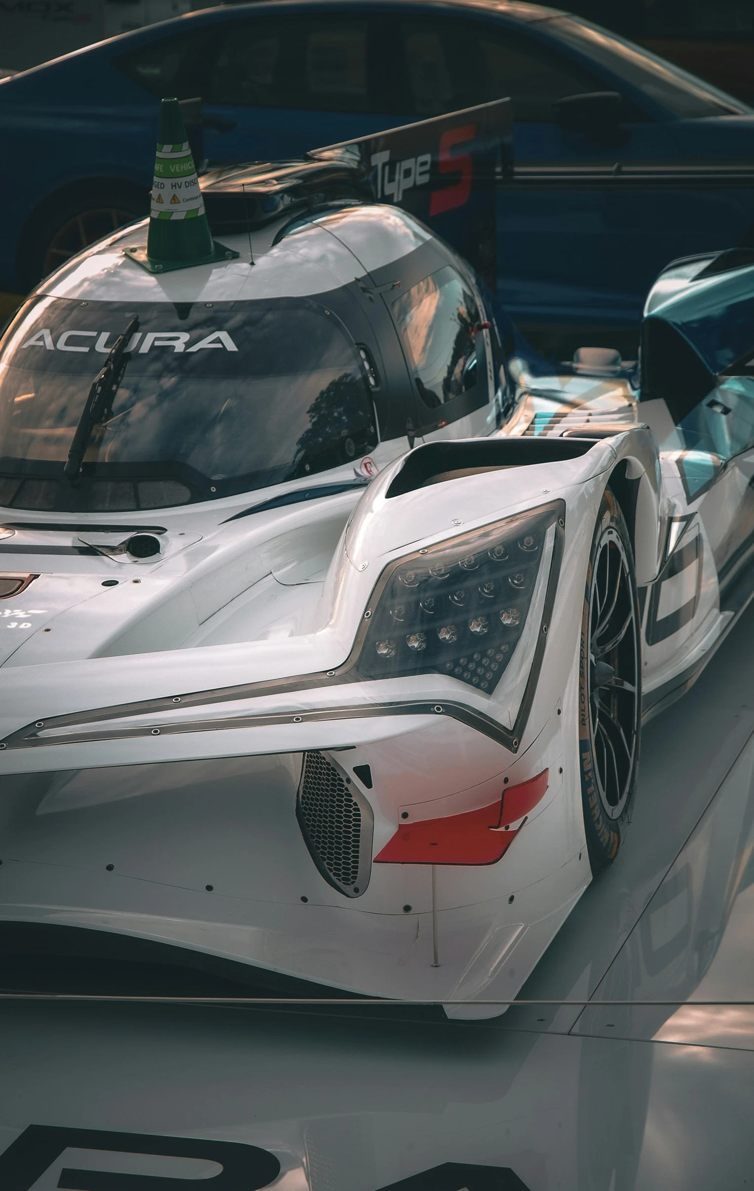 an image of the front end of a race car on display