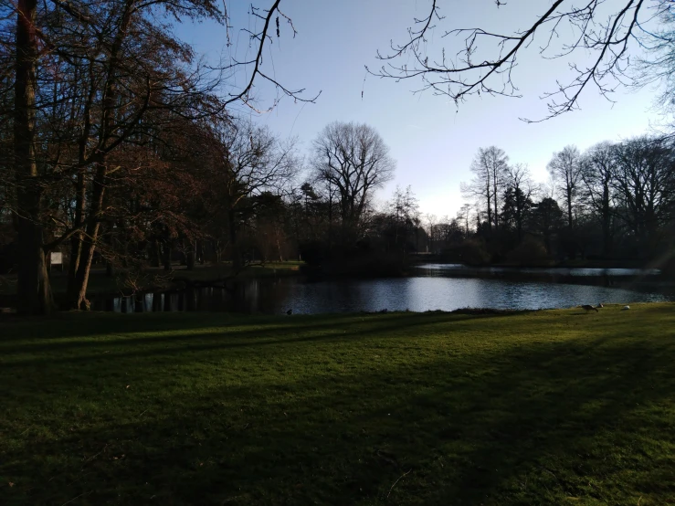 a couple of benches next to a large body of water