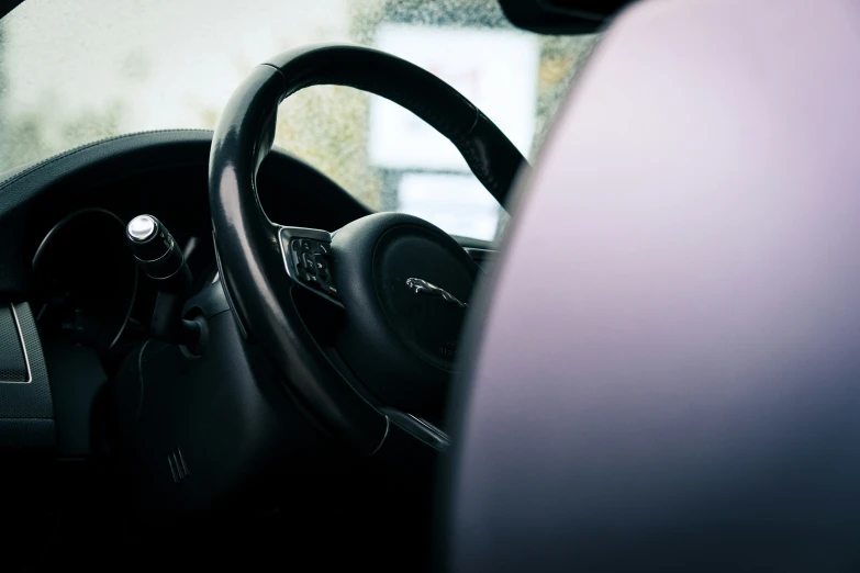 a close up view of the dashboard and a steering wheel