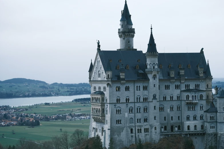 there is an old building that has been built into the mountains