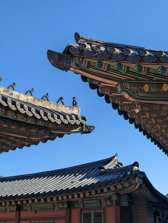 a building with some birds perched on top of it