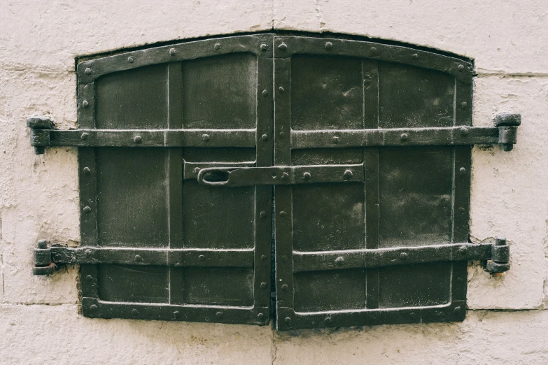 the old door is placed near the brick wall