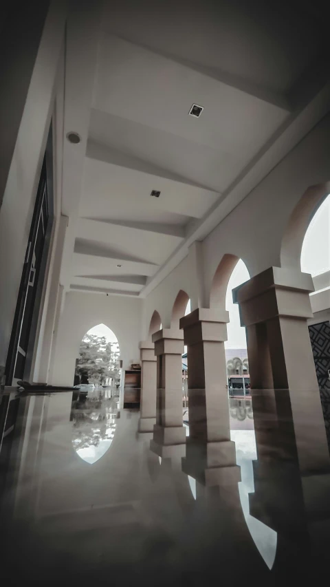 an empty lobby is pographed in black and white