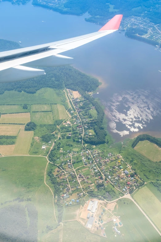 a view from a jetliner looking at a land below