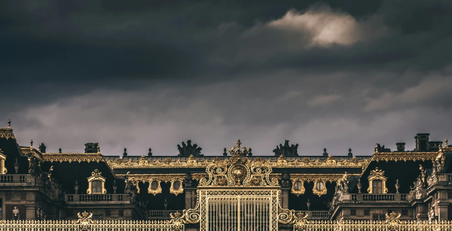 an ornate facade of a palace is shown in the sky