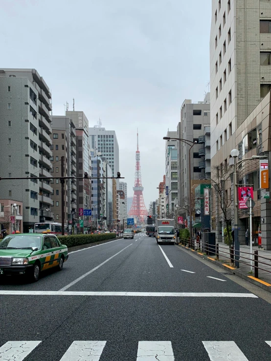 the street is empty and the cars are driving