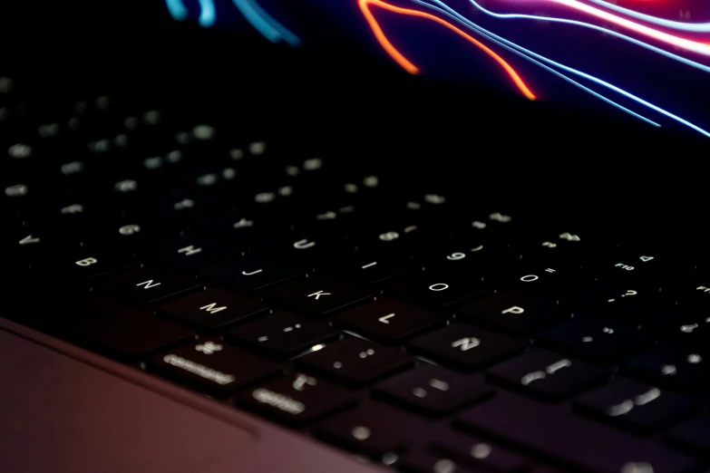 a neon image of the front side of a laptop computer