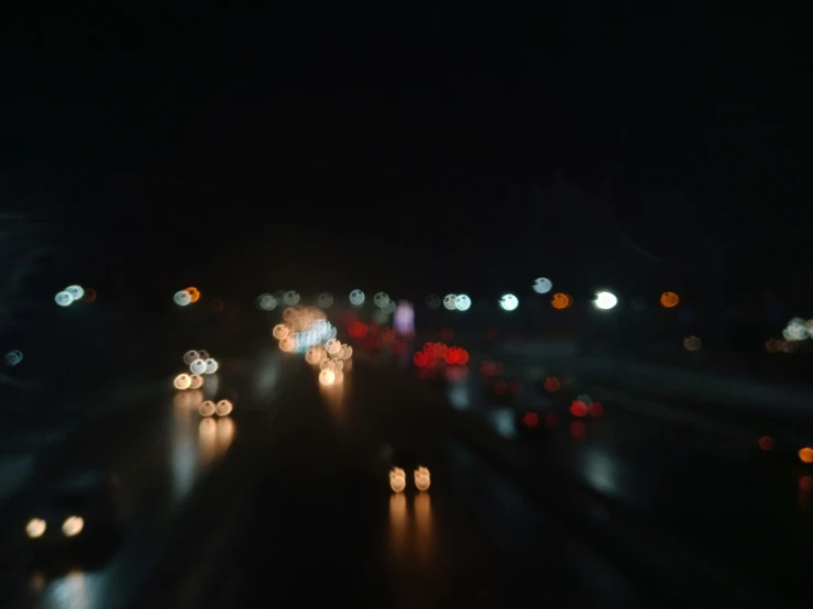 a highway with a bunch of lights at night