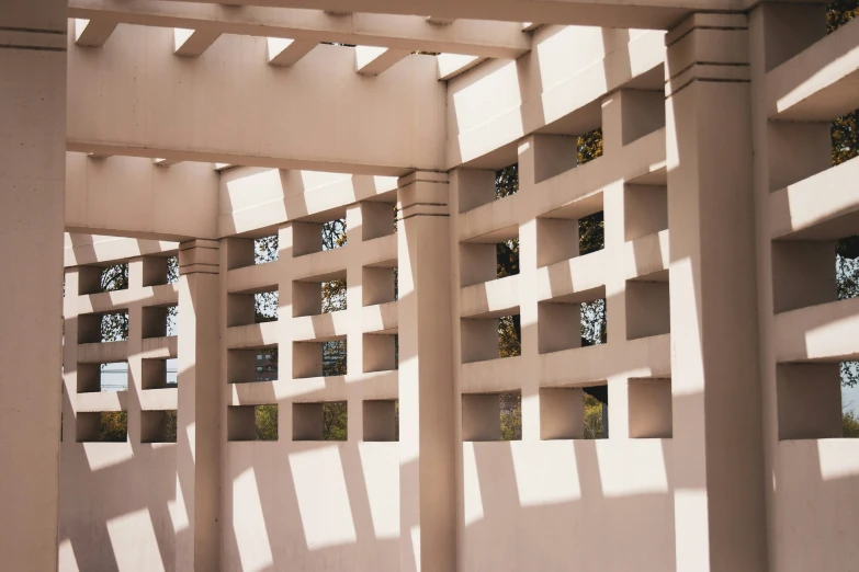 shadows of light coming through a geometricly designed roof