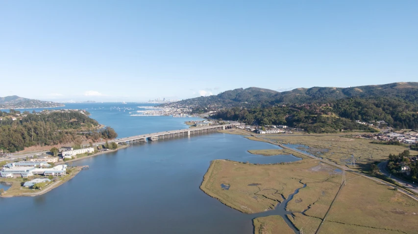 a scenic lake and island in the middle of a landscape