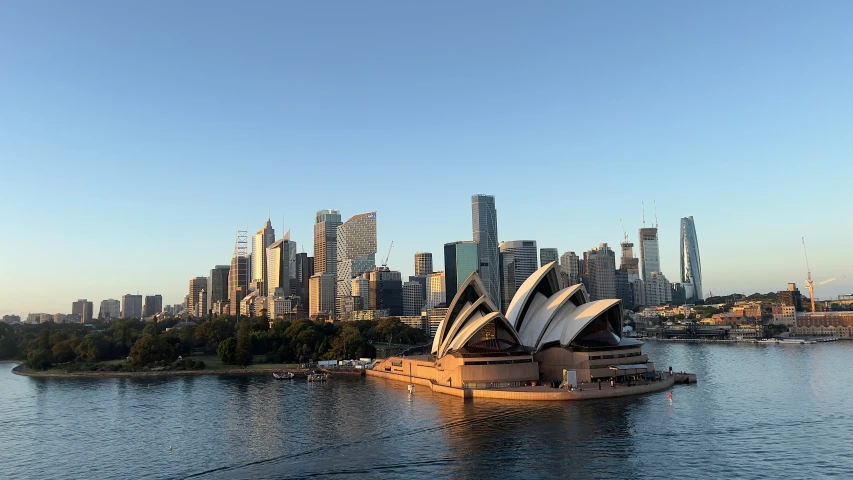 an image of city skyline with sailboats out in the water