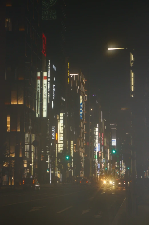 the city's traffic light are brightly lit in the night