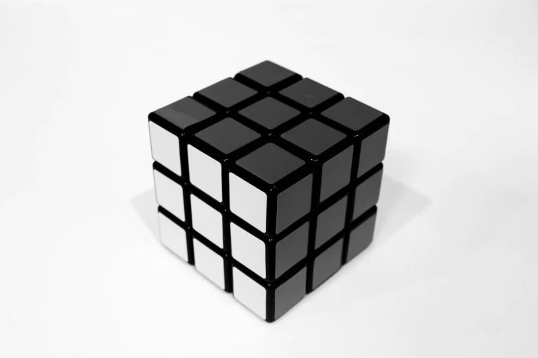 an angled view of a small cube, showing one individual's face