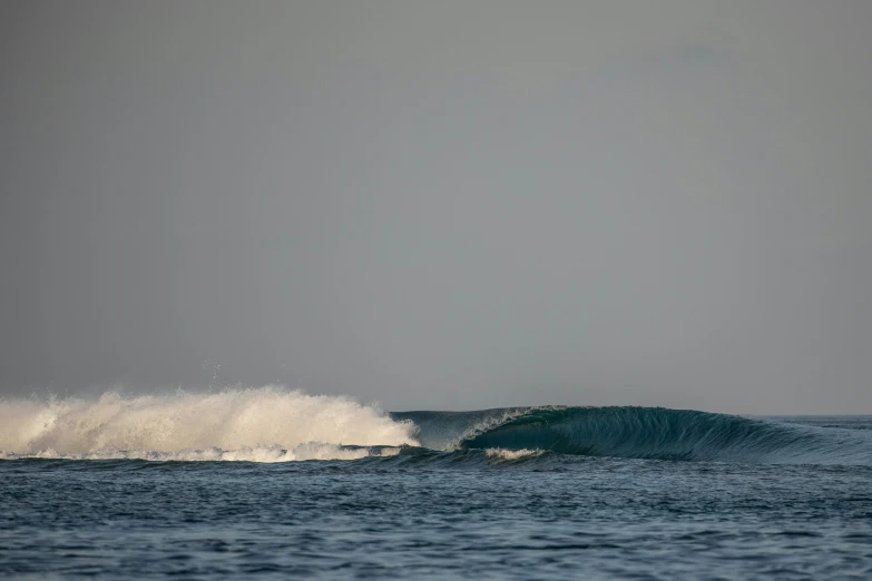 a big wave coming up from the ocean