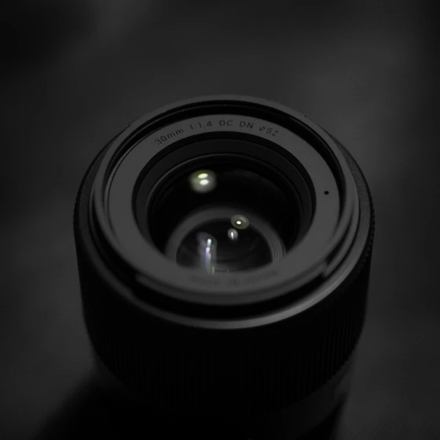 the lens has a small circular opening to the camera