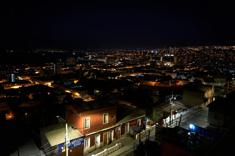 a city at night with buildings and lights