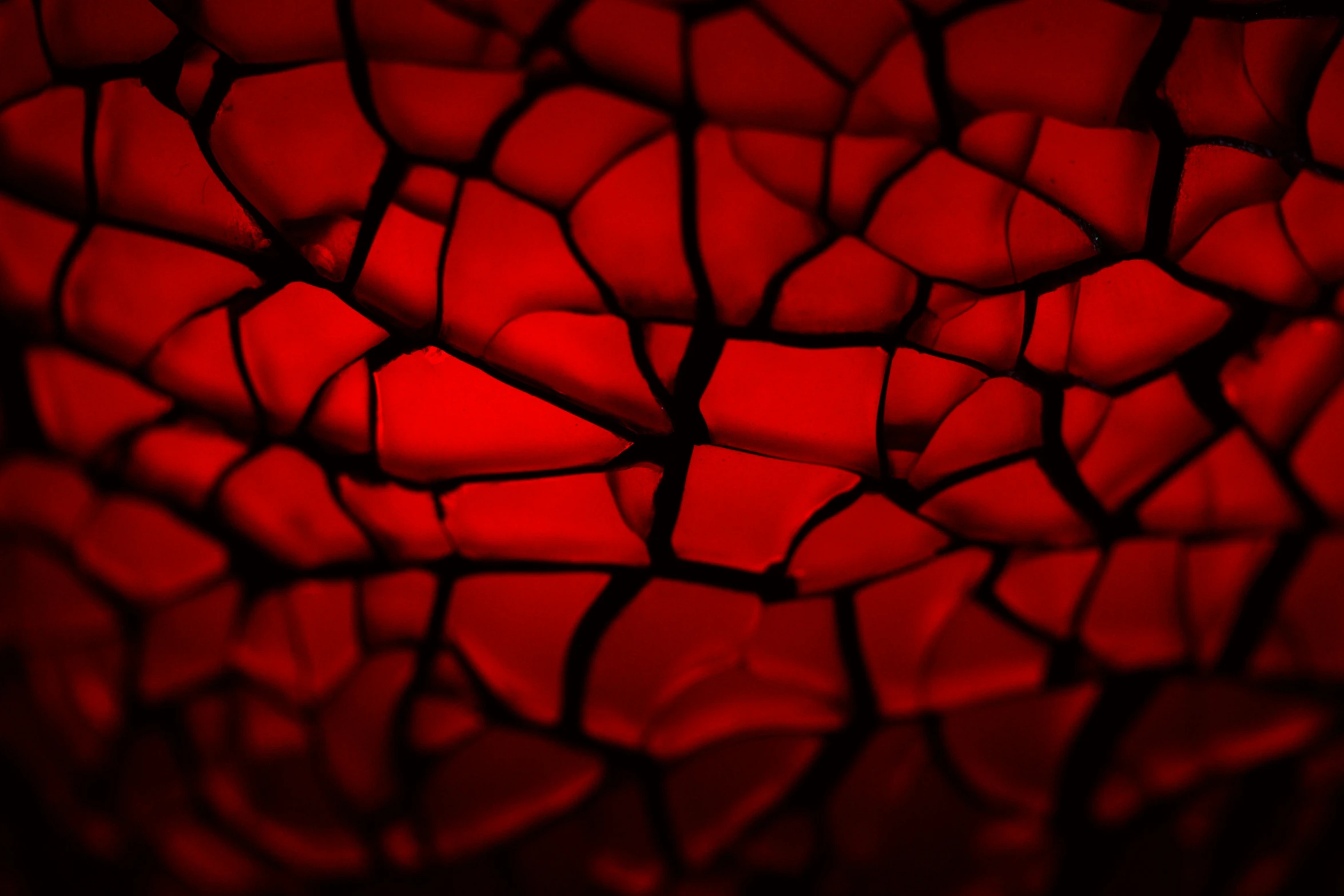 a closeup of a red abstract design