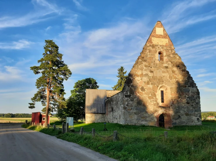 a church is next to a dirt road