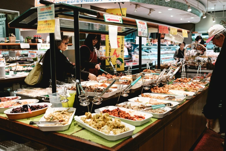 a bunch of different foods are on display