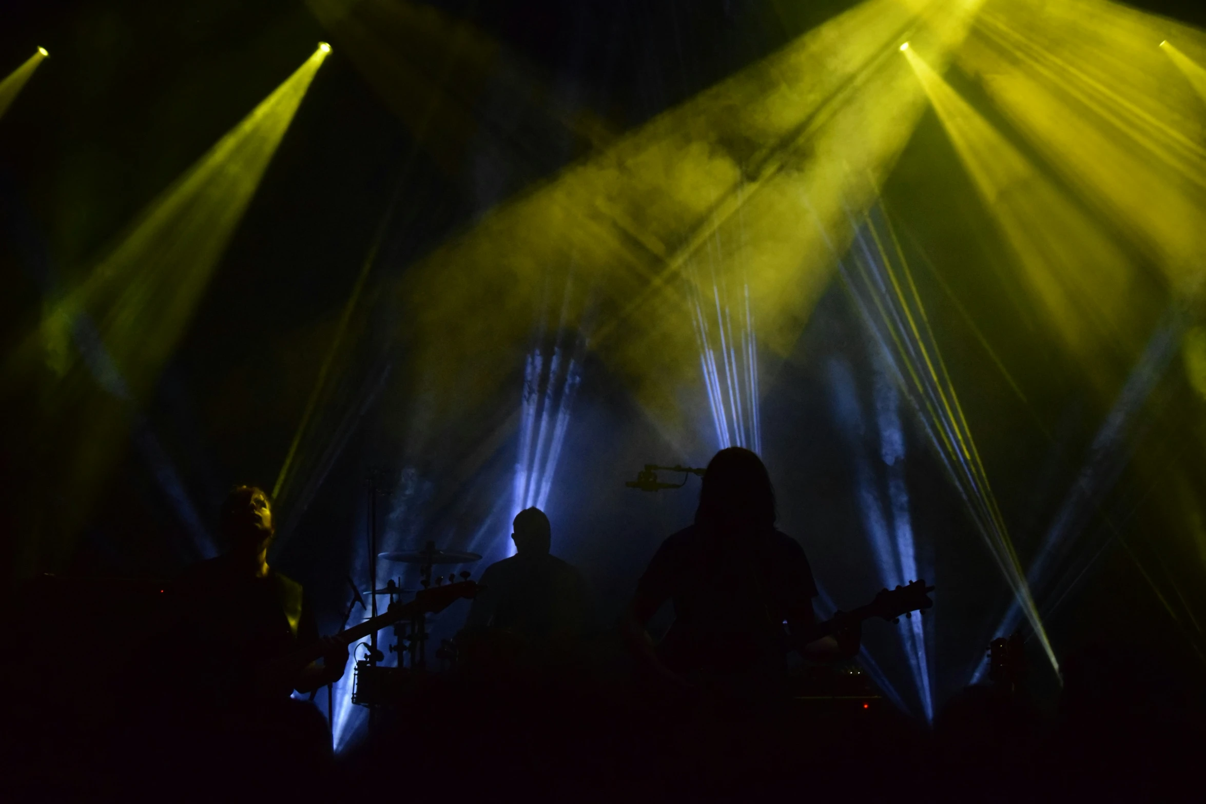 the band playing on the stage for an audience