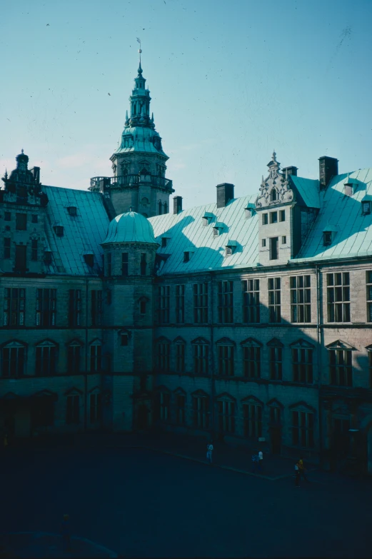 some very pretty buildings and a tower in the sky