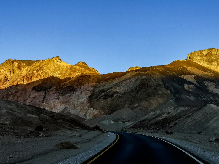 a highway runs through the mountainous terrain