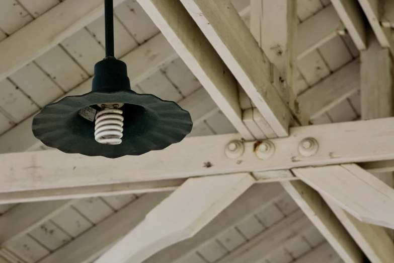 a light fixture in the ceiling of a building