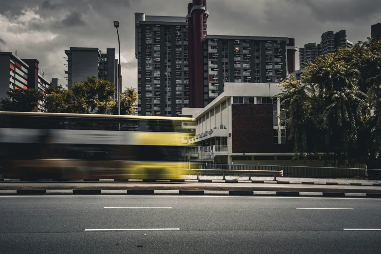 a bus that is riding down a city street