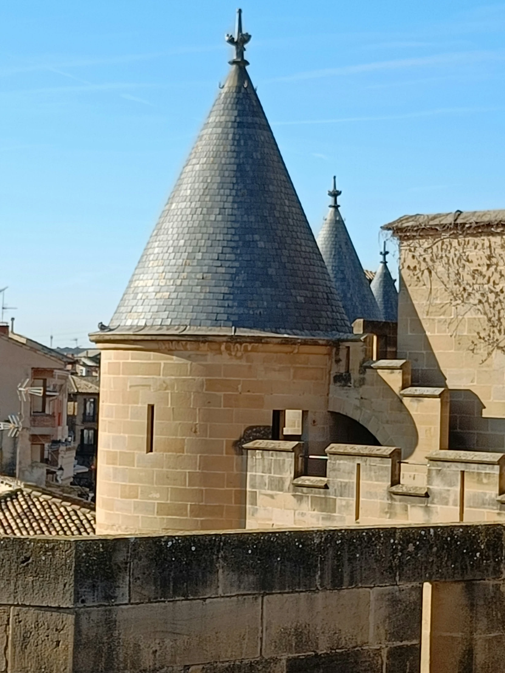 two large towers next to each other on a building