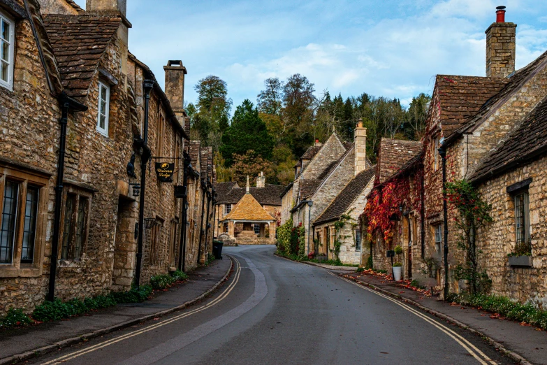 there are stone buildings that are along the street