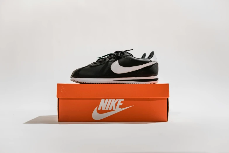 the nike sneakers is in an orange box