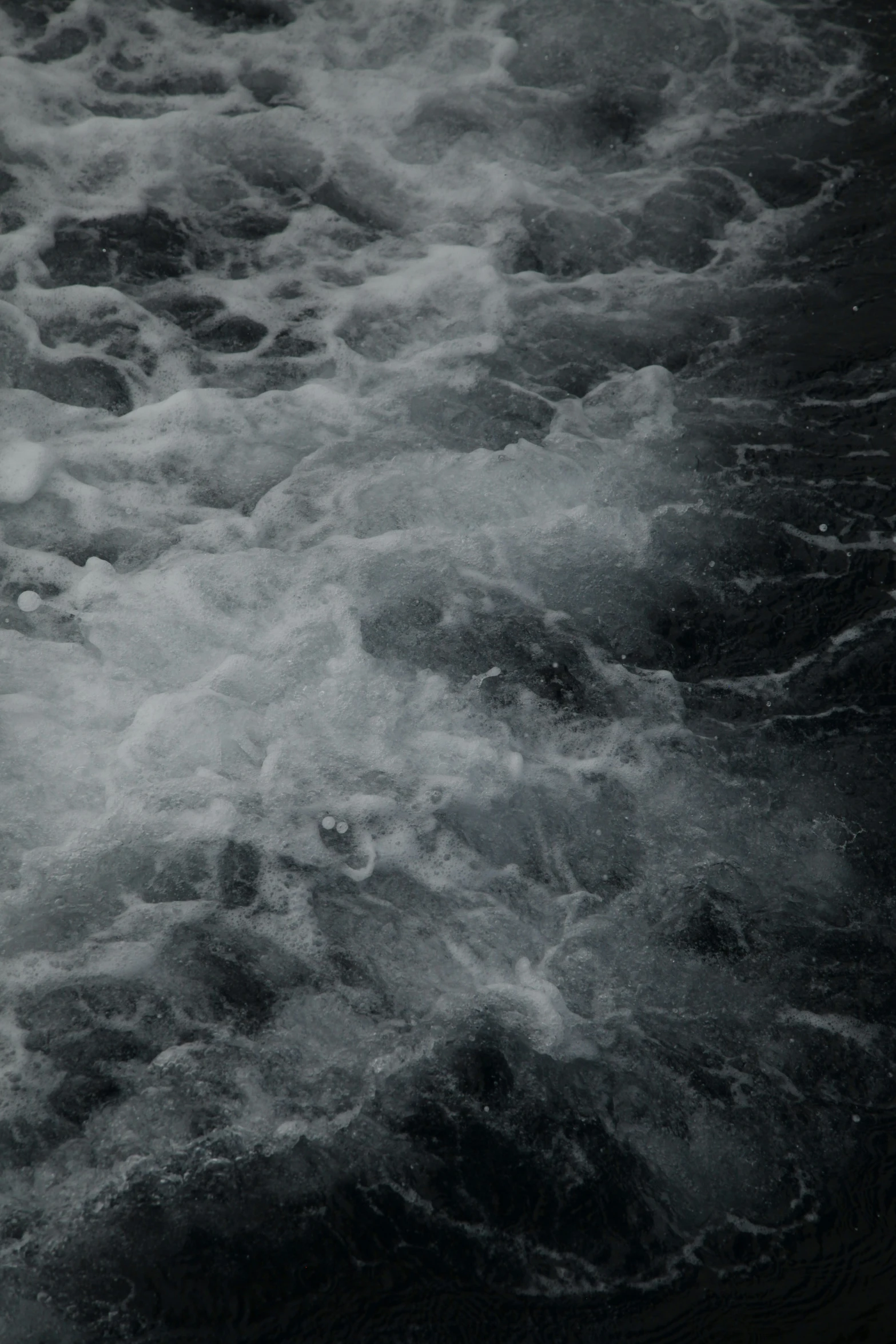 large waves moving in and out of the water