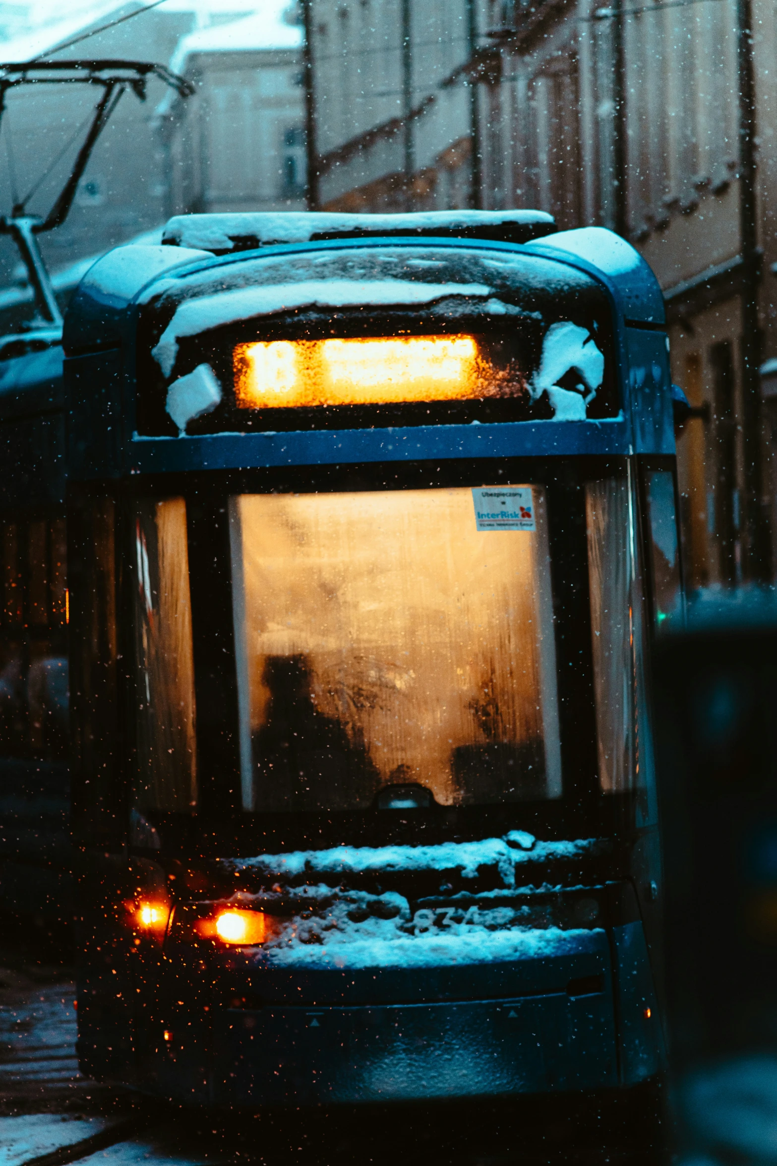 a public transit bus moving down the street