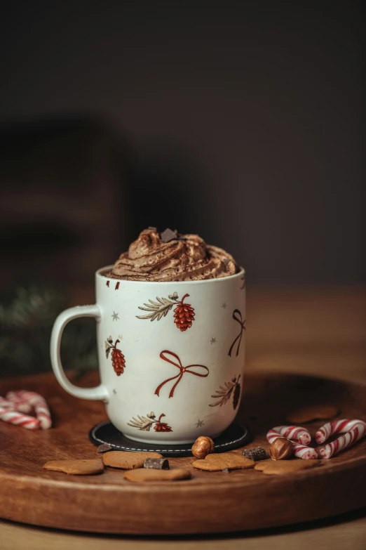  chocolate in a holiday cup with nuts and candy canes